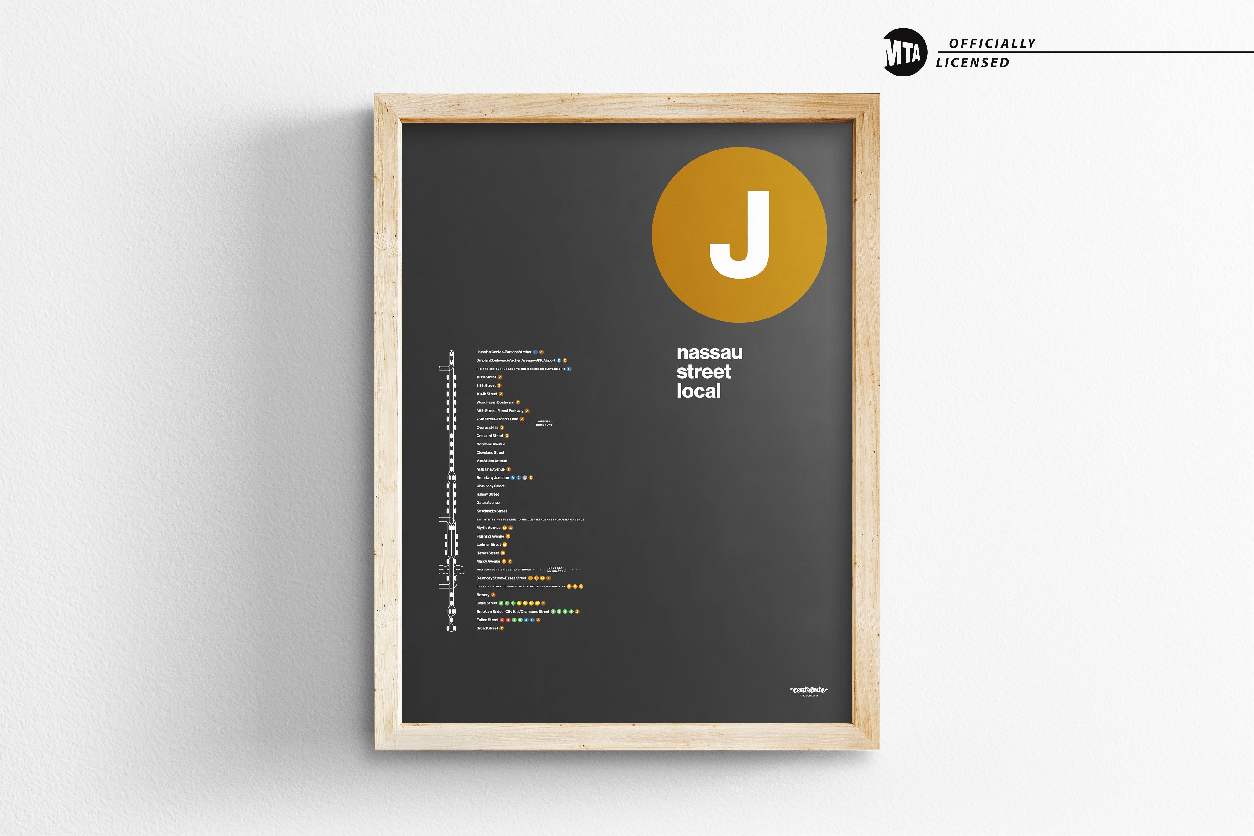 a black and yellow poster hanging on a wall