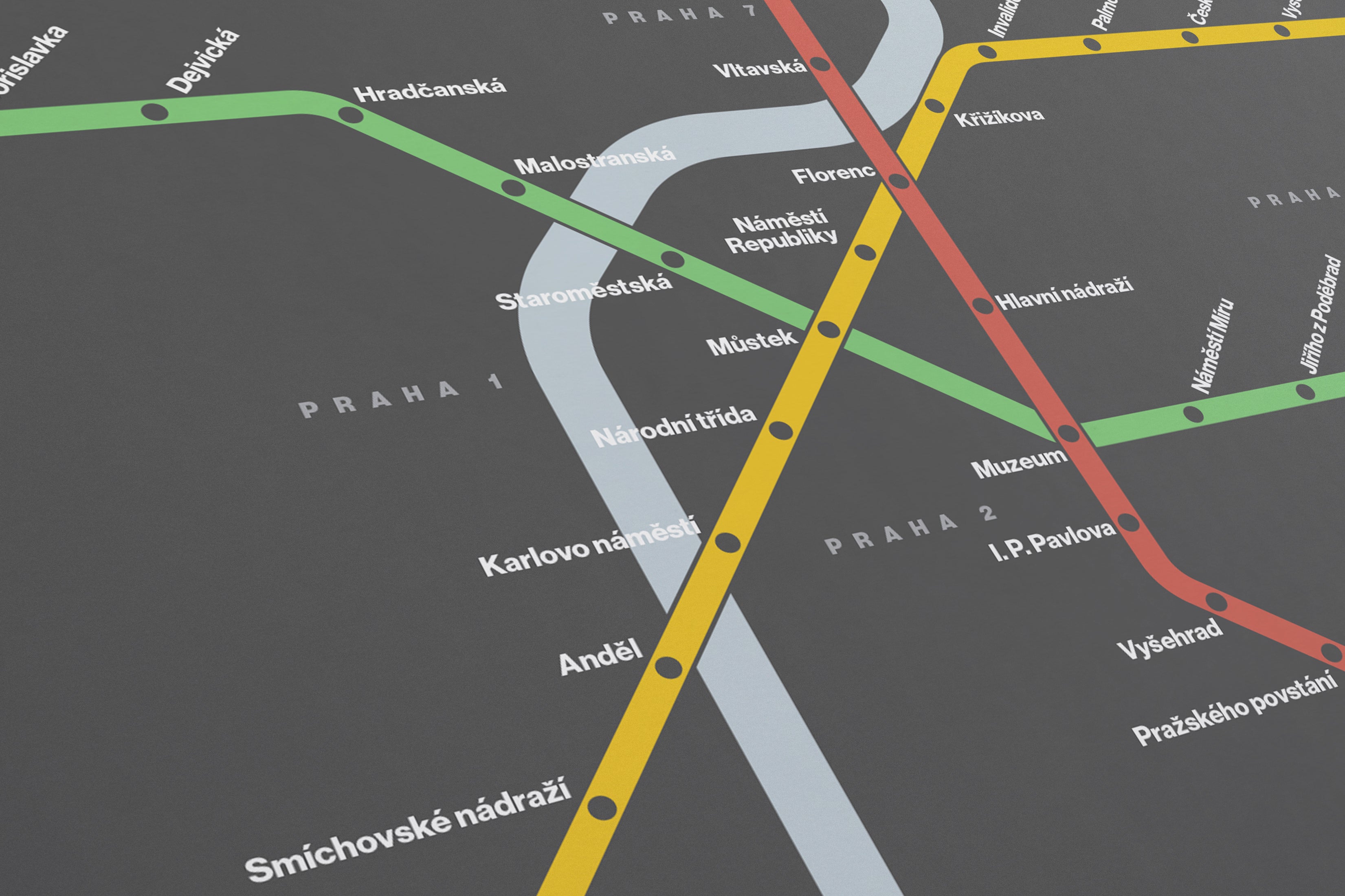 The image is a subway map of Prague, Czech Republic, showing the various lines and stations.