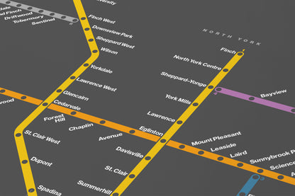 The image is a subway map showing the routes and stops of a public transportation system.