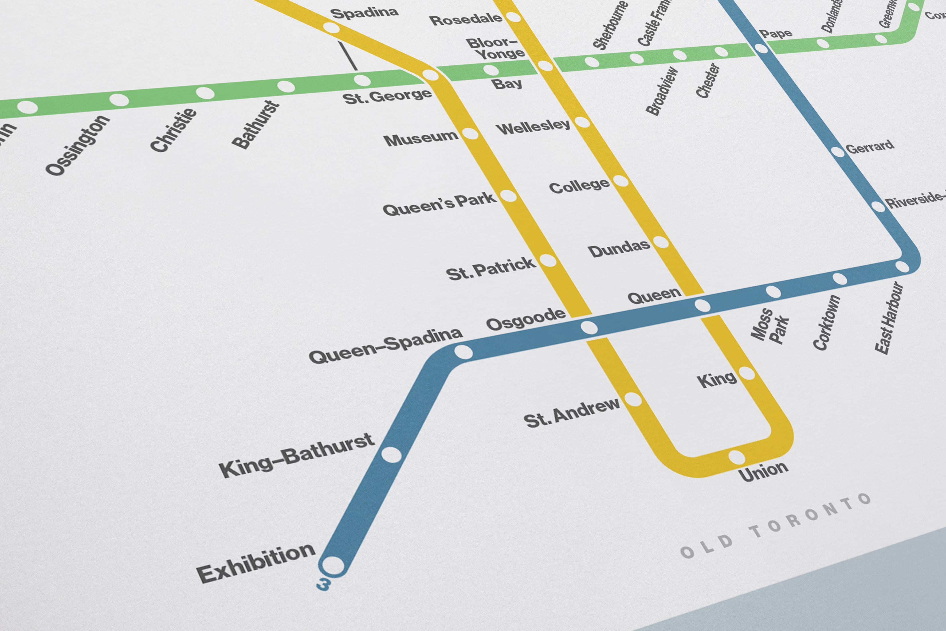 The image is a subway map of Toronto, Canada, showing the various lines and stations along with their names.
