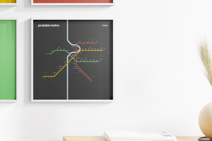 a poster of a subway map hanging on a wall.