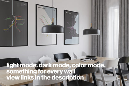 a modern and minimalist dining room with a wooden table and chairs, three framed posters on the wall, and two black pendant lights hanging above the table.