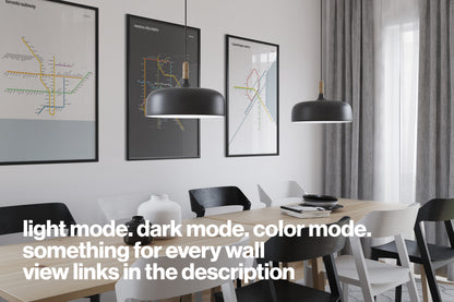 a modern dining room with a wooden table and chairs, three framed posters on the wall, and three pendant lights hanging above the table.